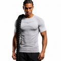 Men's light grey seamless muscle fit training tee with textured contour details