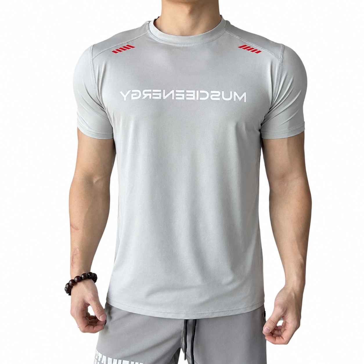 Mens light grey performance tee with red shoulder detail and lightweight training style