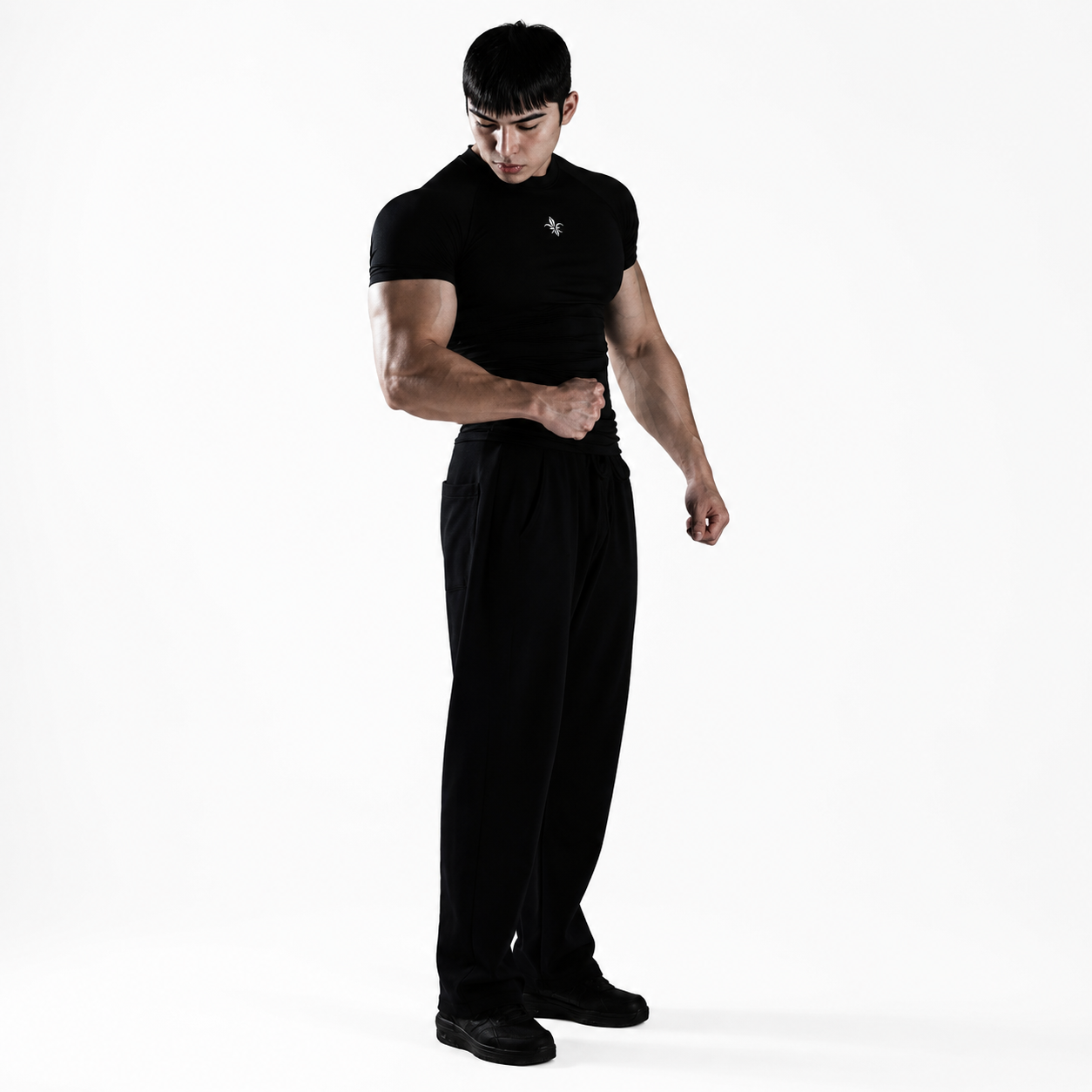 Core Black: Mens black minimal logo compression tee with smooth stretch look and fitted silhouette
