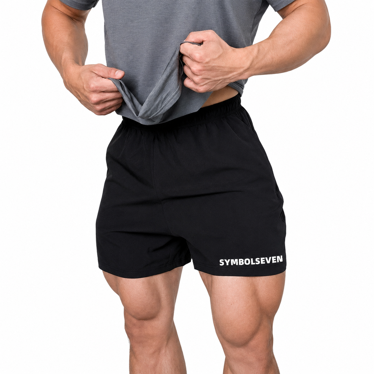 Core Black: Mens black lightweight training shorts with elastic waistband and white hem logo