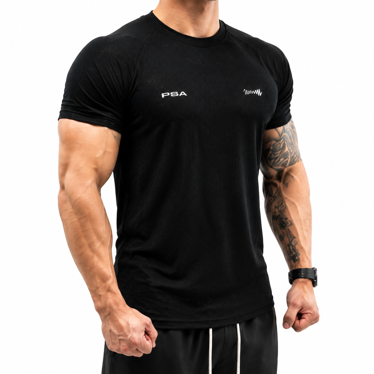 Varenform black muscle fit sports tee for men with cooling mesh texture and stronger upper-body shape