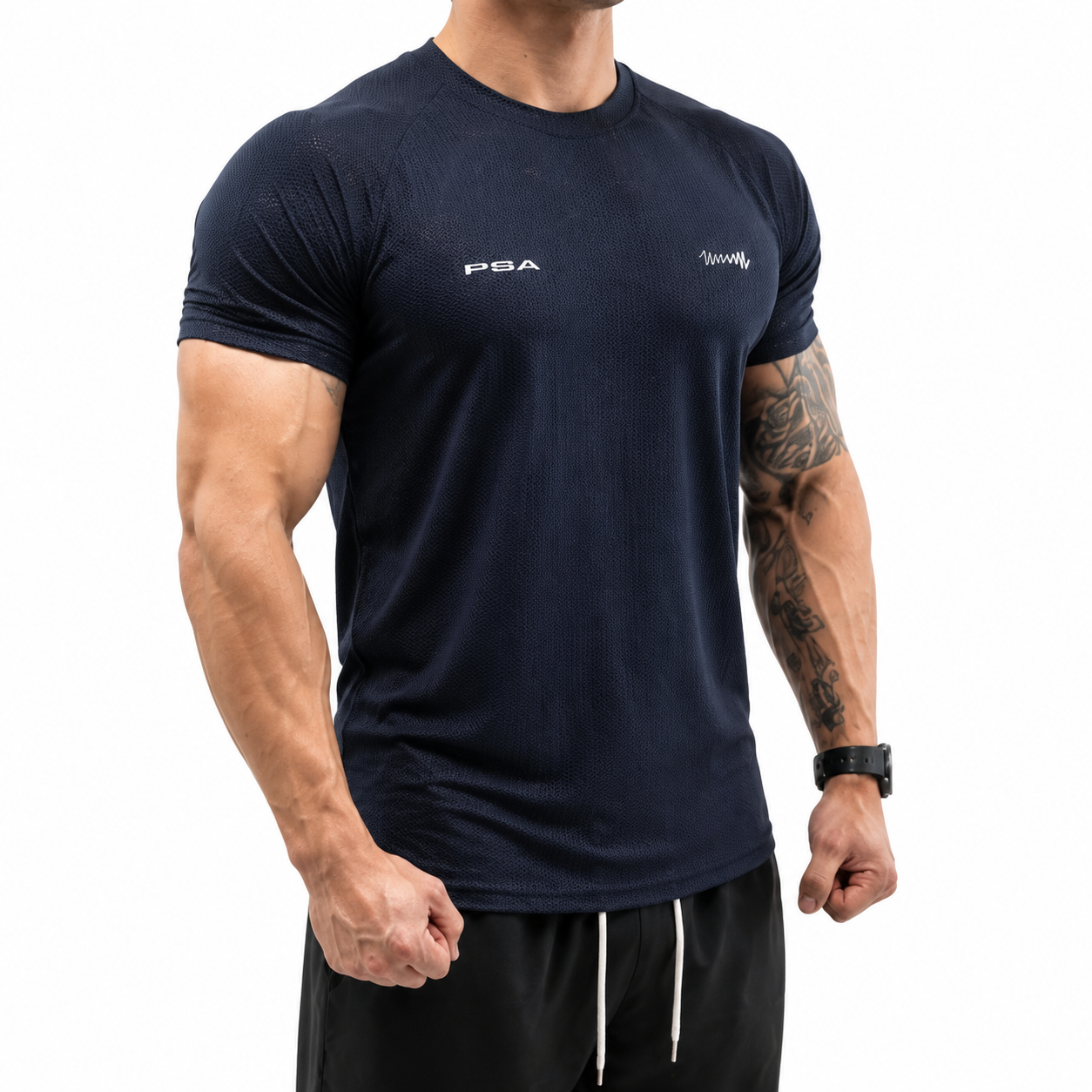 Varenform navy blue athletic sports tee for men with fitted sleeves, broad shoulder look, and clean waist fit