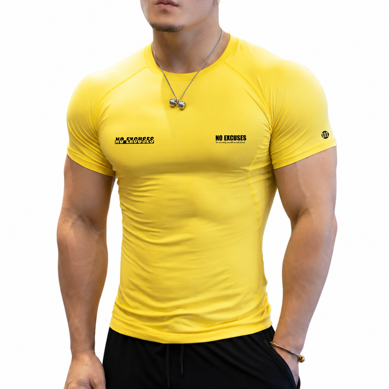 Yellow men's muscle fit training shirt with black chest graphics and raglan seams