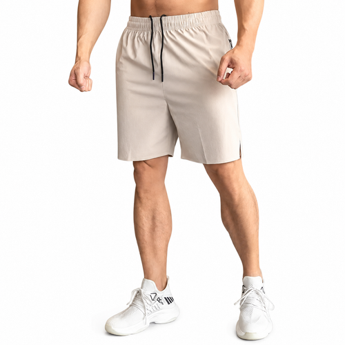 Stone beige men's lightweight training shorts with black drawstring and zip pocket