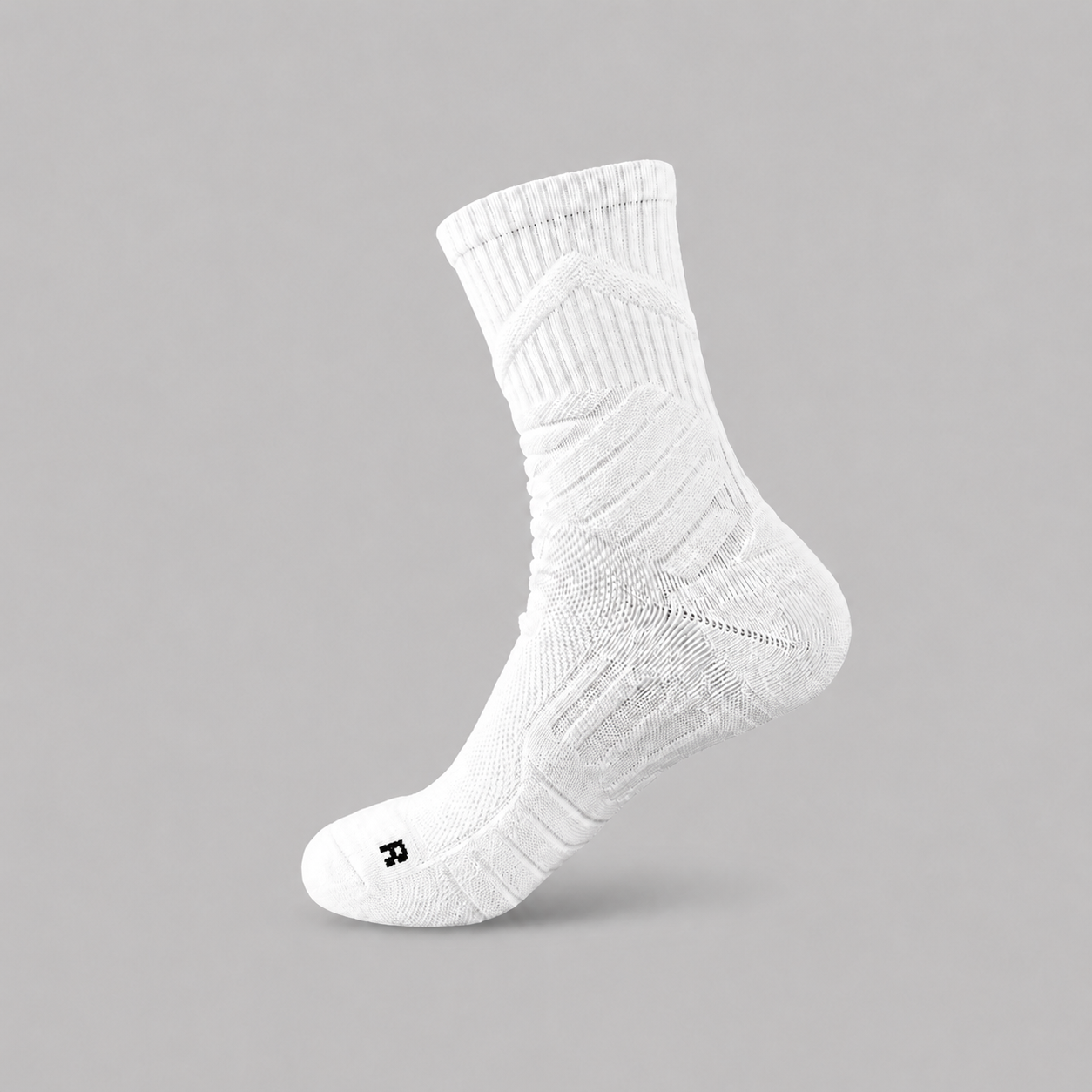 White performance crew sock close-up with textured support zones