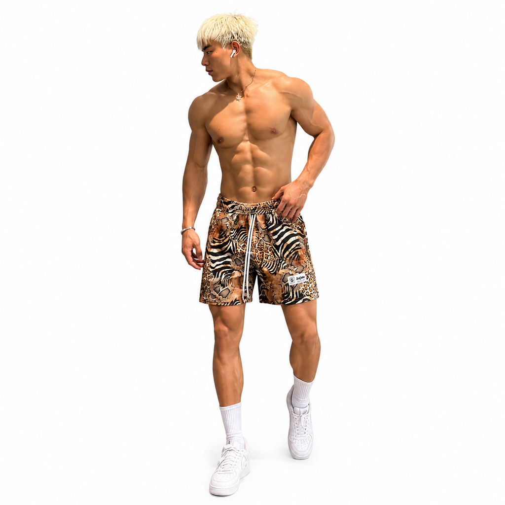 Varenform safari animal print training shorts styled shirtless with white sneakers