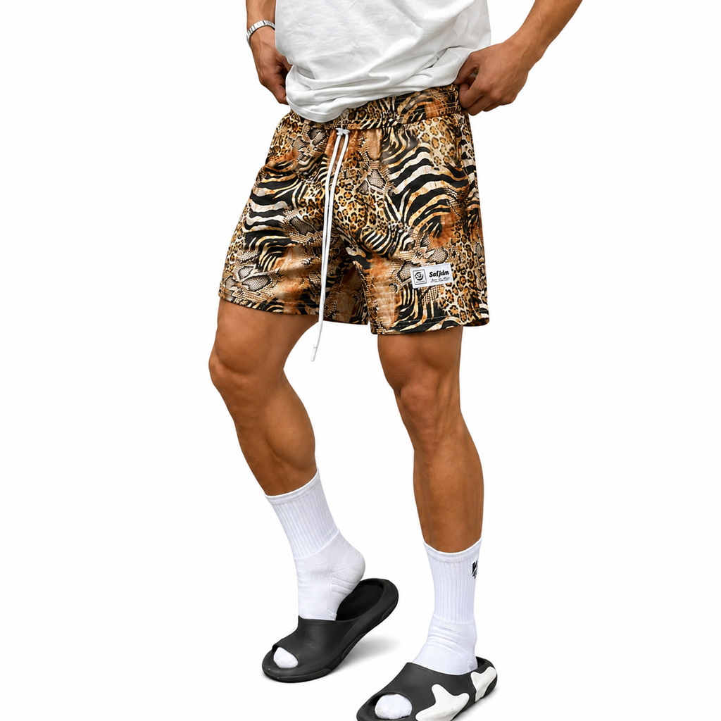 Varenform men’s animal print shorts worn with white T-shirt and slides