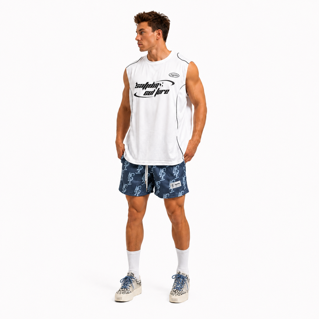 Varenform white sleeveless training tank styled with blue printed shorts
