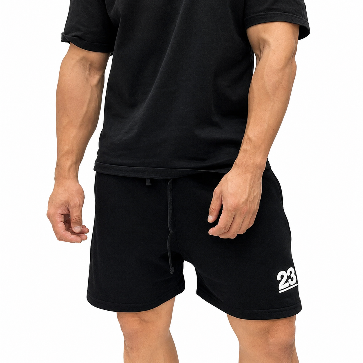 Varenform black 23 training shorts styled with black T-shirt