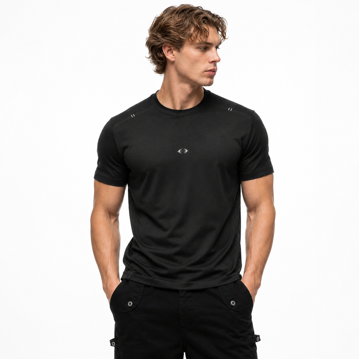 Male model wearing grey Varenform Dragon Scale athletic T-shirt with clean shoulder and chest fit
