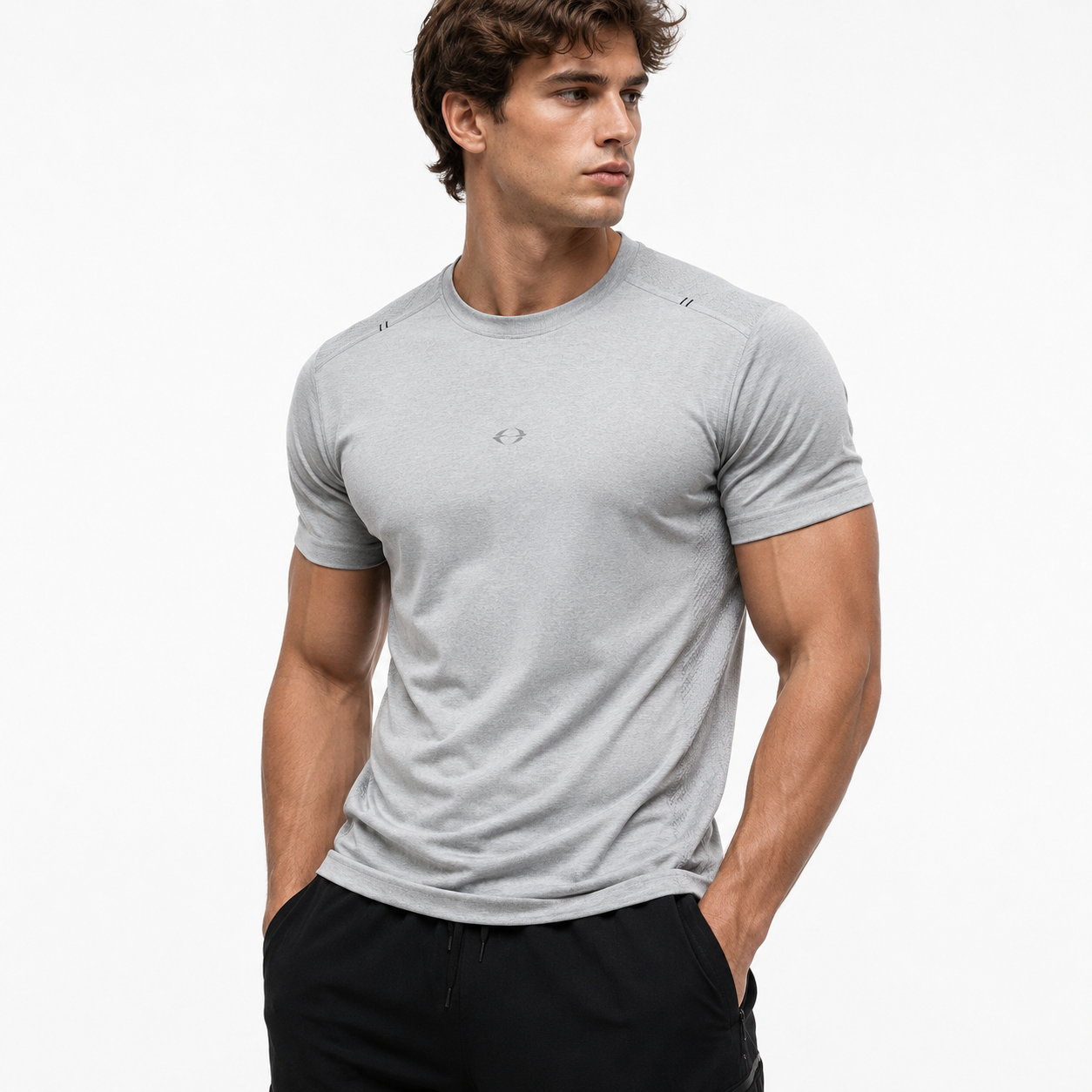 Male model wearing black Varenform Dragon Scale 3D performance tee for gym and daily streetwear