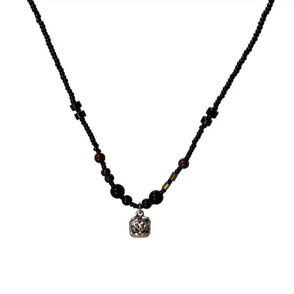 VAREN FORM Lion Bead Pendant Necklace black beaded lion pendant necklace product view
