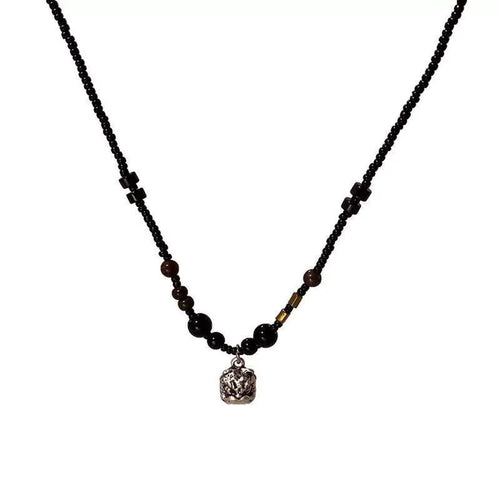 VAREN FORM Lion Bead Pendant Necklace black beaded lion pendant necklace product view