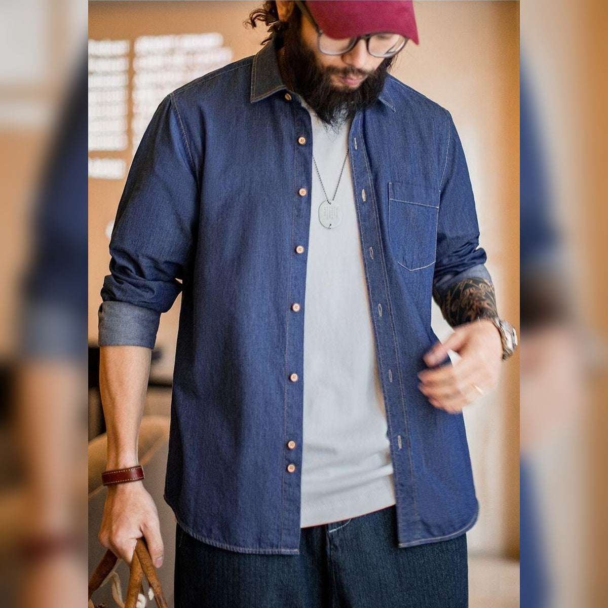 Men's Single-Pocket Blue Denim Work Shirt in blue - worn view
