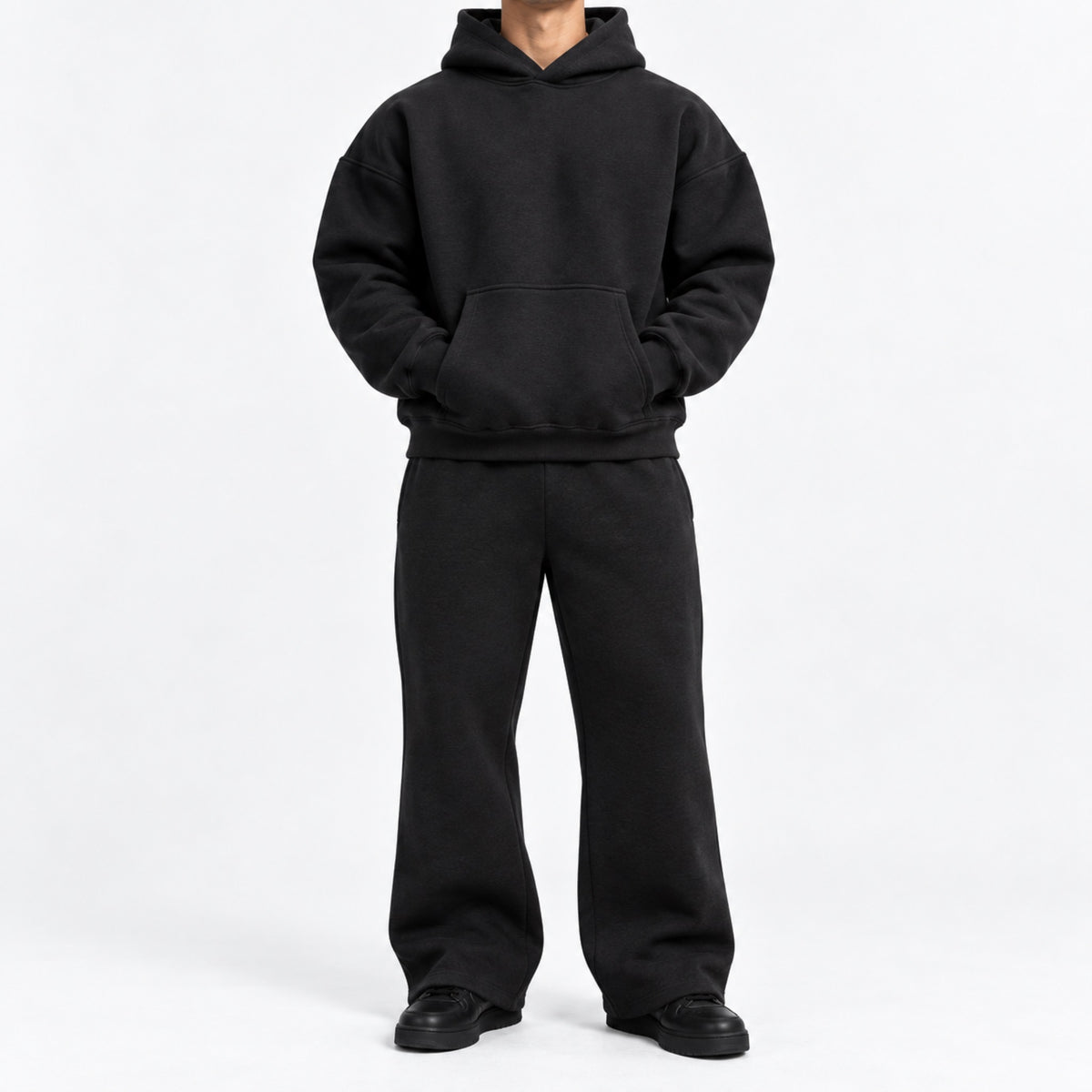 Men's Heavyweight Oversized Hoodie & Sweatpants Set in black - worn view