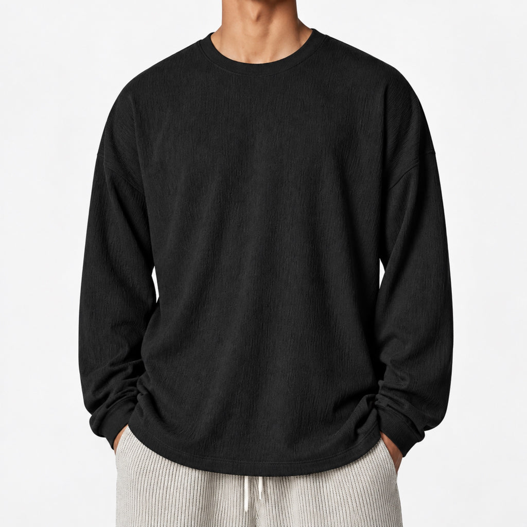 Men's Textured Oversized Long-Sleeve T-Shirt in black - worn view