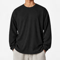 Men's Textured Oversized Long-Sleeve T-Shirt in black - worn view