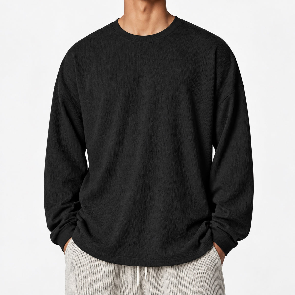 Men's Textured Oversized Long-Sleeve T-Shirt in black - worn view