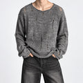 Men's Distressed Open-Knit Long-Sleeve Sweater in black - worn view