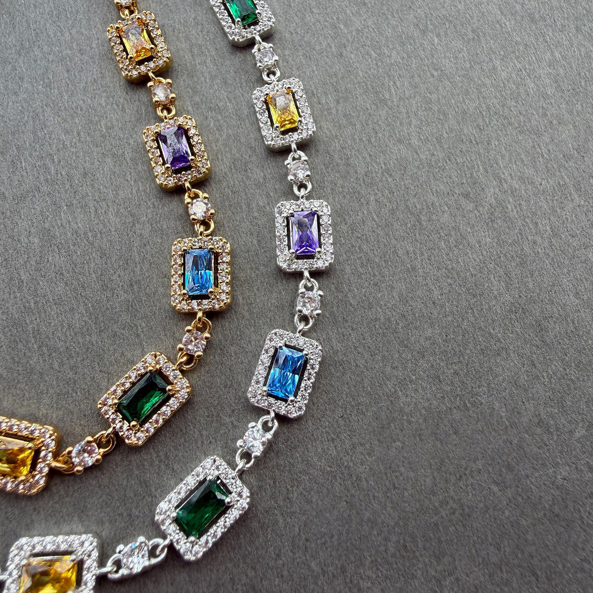 Close-up of multicolor rectangular stones and clear accent stones on the bracelet