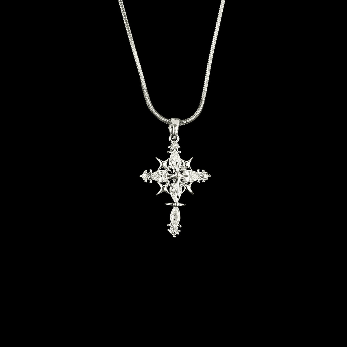 Silver-tone ornate stone-detail cross necklace - product view