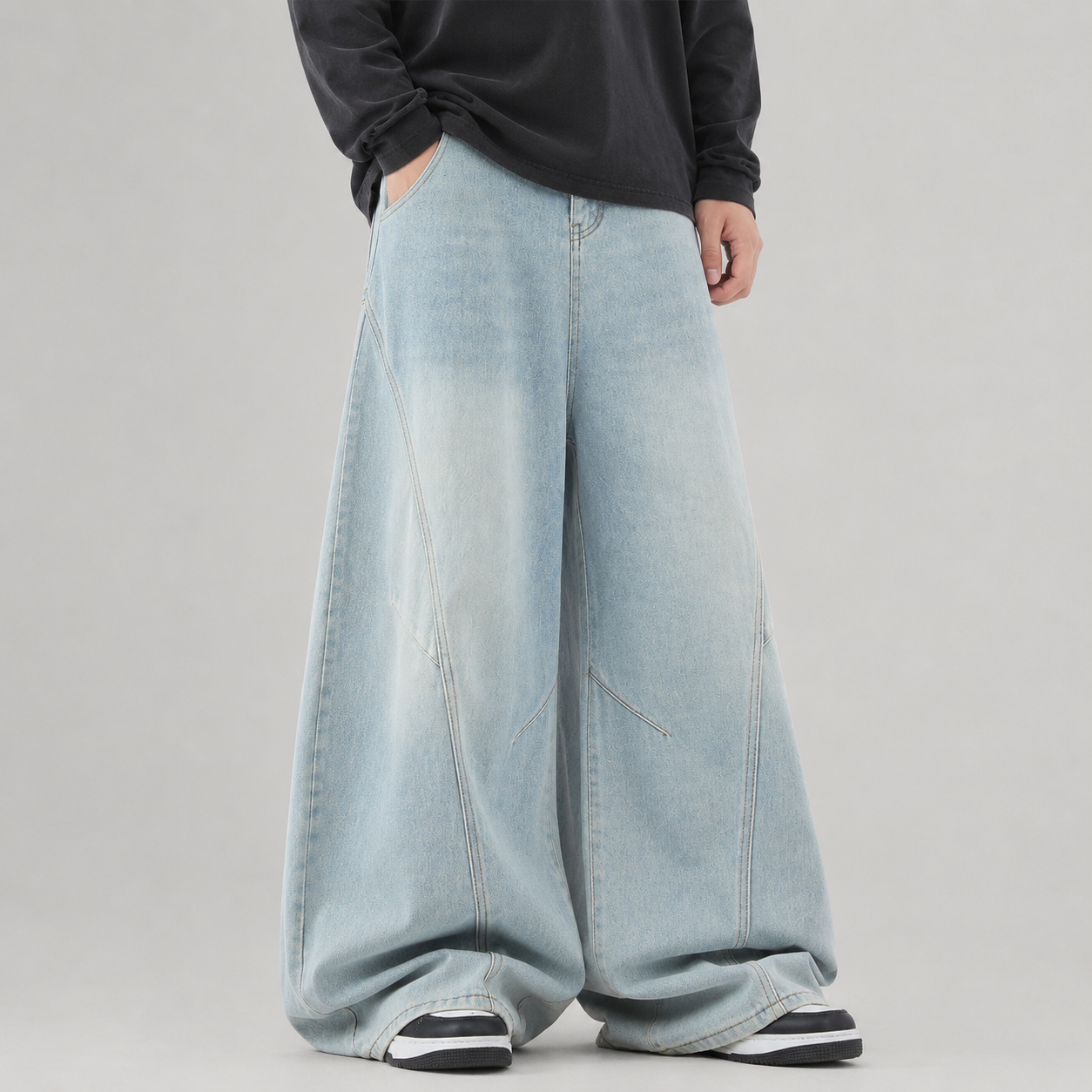 VAREN FORM Deconstructed Curved Wide-Leg Jeans light blue wash model front