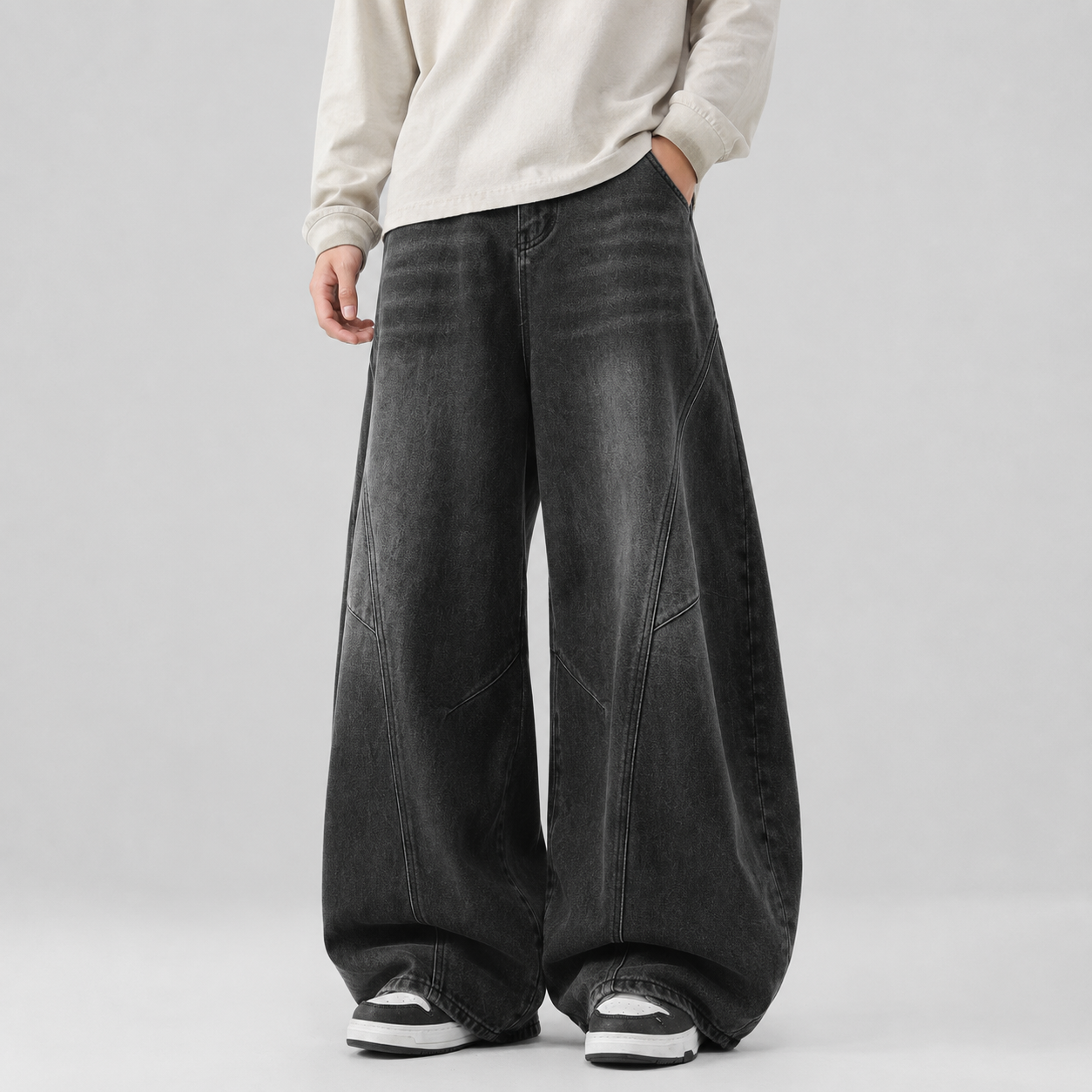 VAREN FORM Deconstructed Curved Wide-Leg Jeans washed black model front
