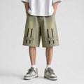 Men's Zip Detail Denim Shorts in Olive Khaki, model front view