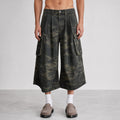 Men's Camo Utility Cropped Pants in Dark Olive Camo, model front view
