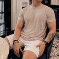 VARENFORM lyocell crewneck short sleeve tee in sand beige on model