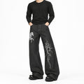 Men's Horse-Print Contrast-Stitch Wide-Leg Jeans in black - worn view