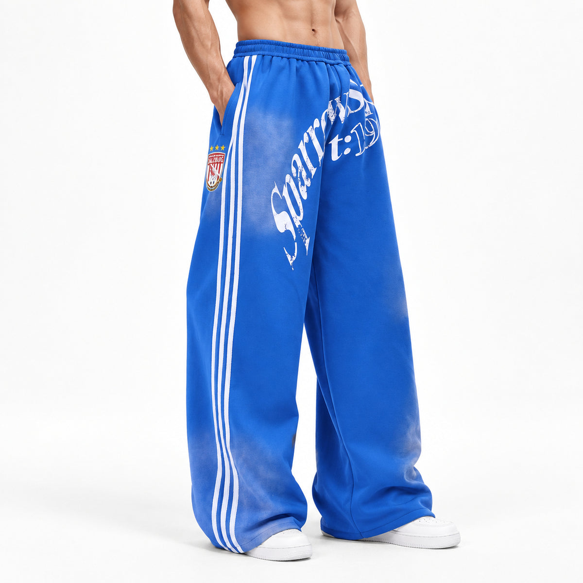 Men's Letter-Print Side-Stripe Wide-Leg Track Pants in blue - worn view