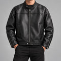 Men's stand-collar faux-leather zip jacket in black - worn view