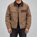 Men's washed cotton canvas workwear jacket in taupe - worn view