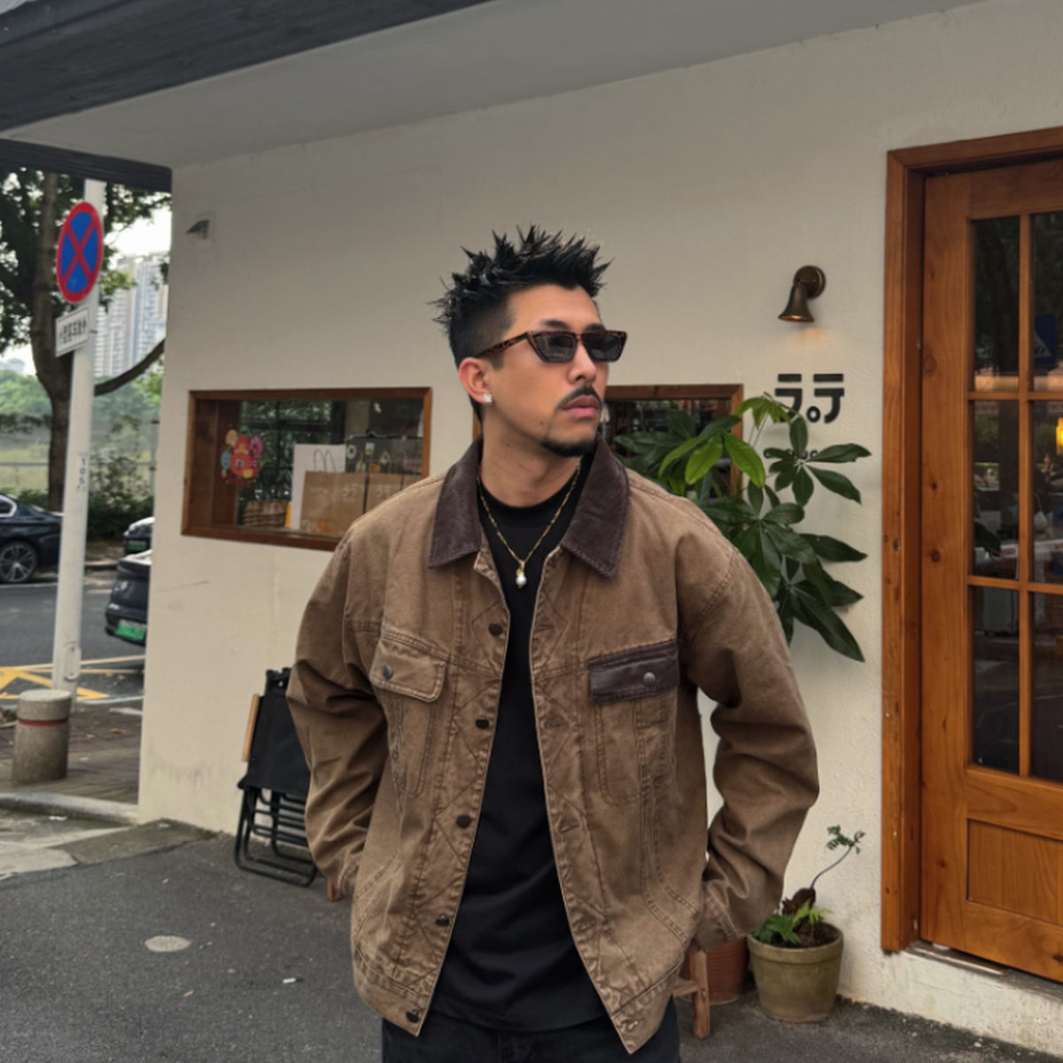 Men's washed cotton canvas workwear jacket in taupe - worn front view