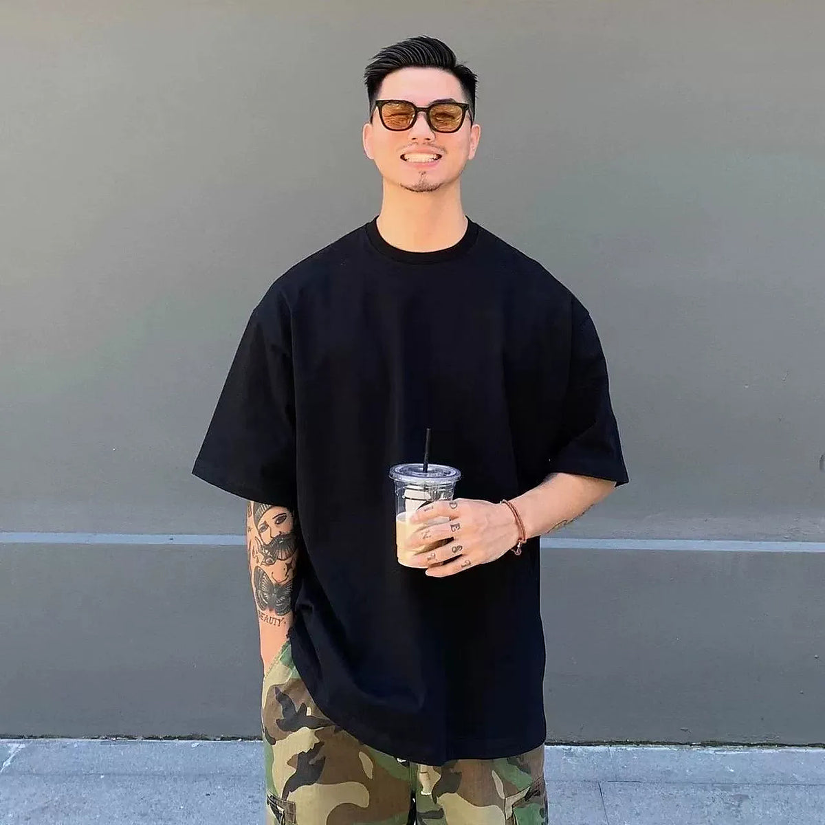 Men's black 320 GSM heavyweight cotton short-sleeve crewneck T-shirt worn as a base layer